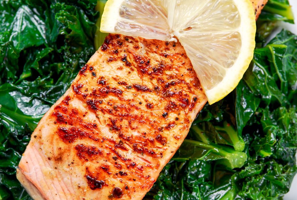 Warm salmon, kale, sesame & ginger salad