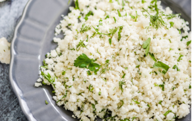 Kale and cauliflower couscous with baked salmon