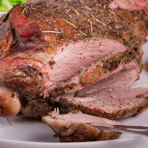 Slow cooked roast lamb, with roasted squash and parsnip chips