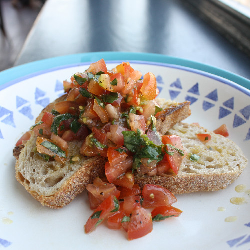 Bruschetta with tomatoes, basil and olive oil